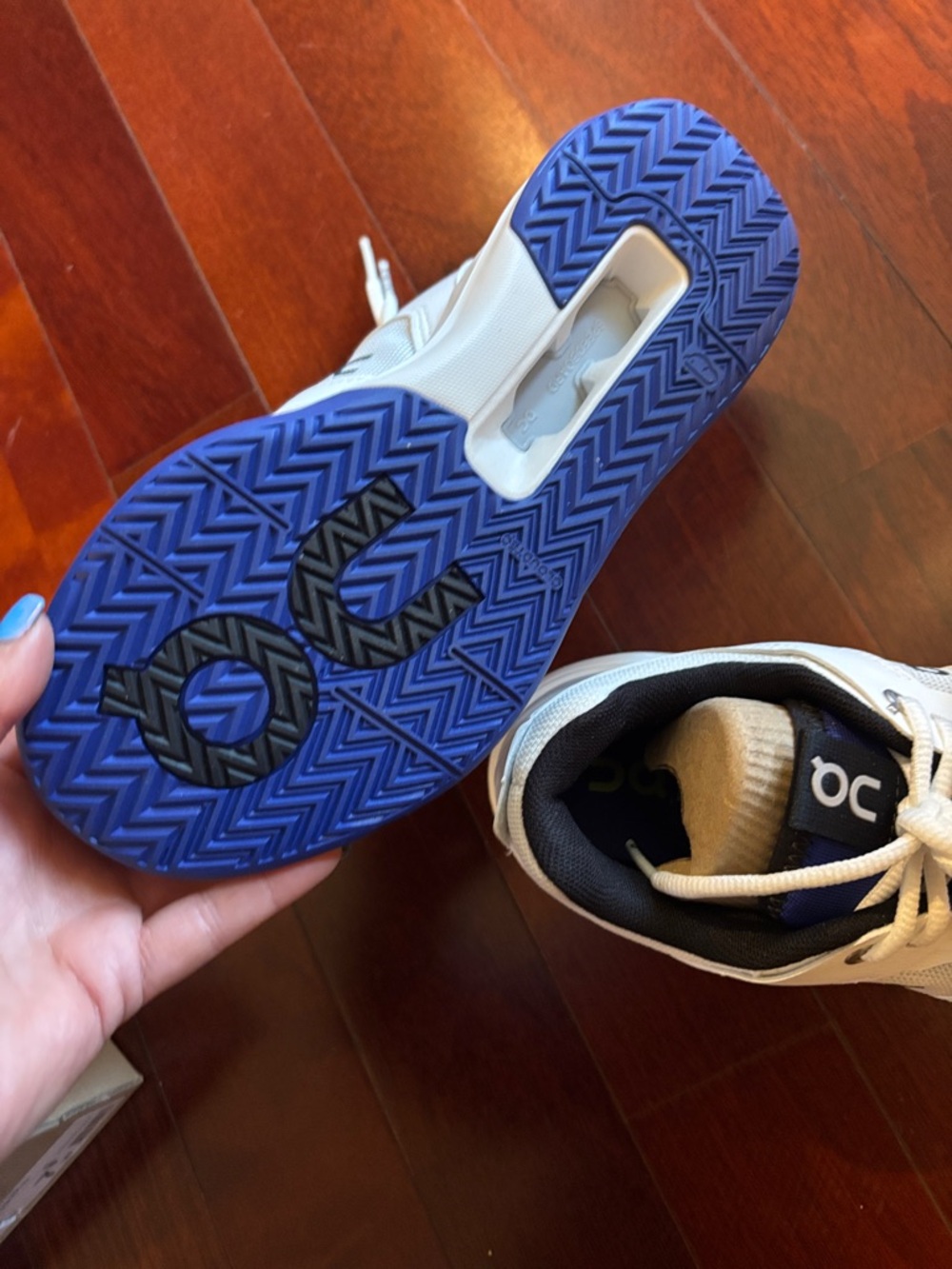 On Running women,s White Athletic Shoes with Blue Accents - Picture 2 of 5